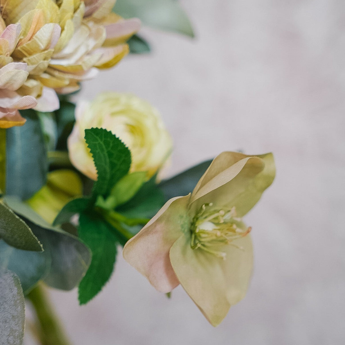 Hellebore and eucalyptus foliage in the Camille silk bouquet