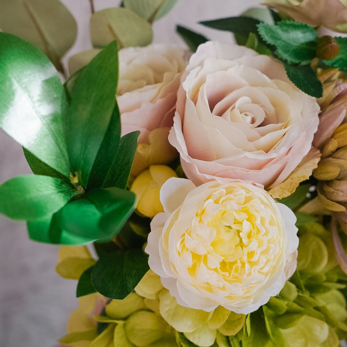 Pink rose and cream ranunculus in the Camille silk bouquet
