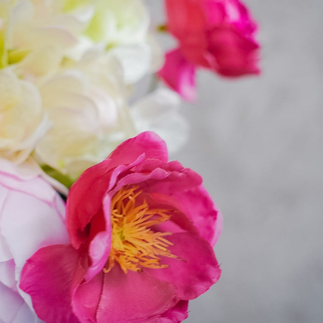 Fuchsia ranunculus in the Elodie bouquet
