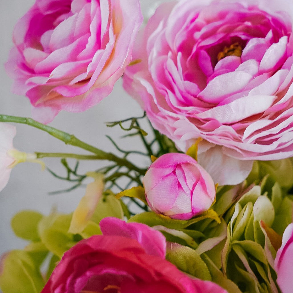 Rounded rose-toned peonies in the Elodie bouquet