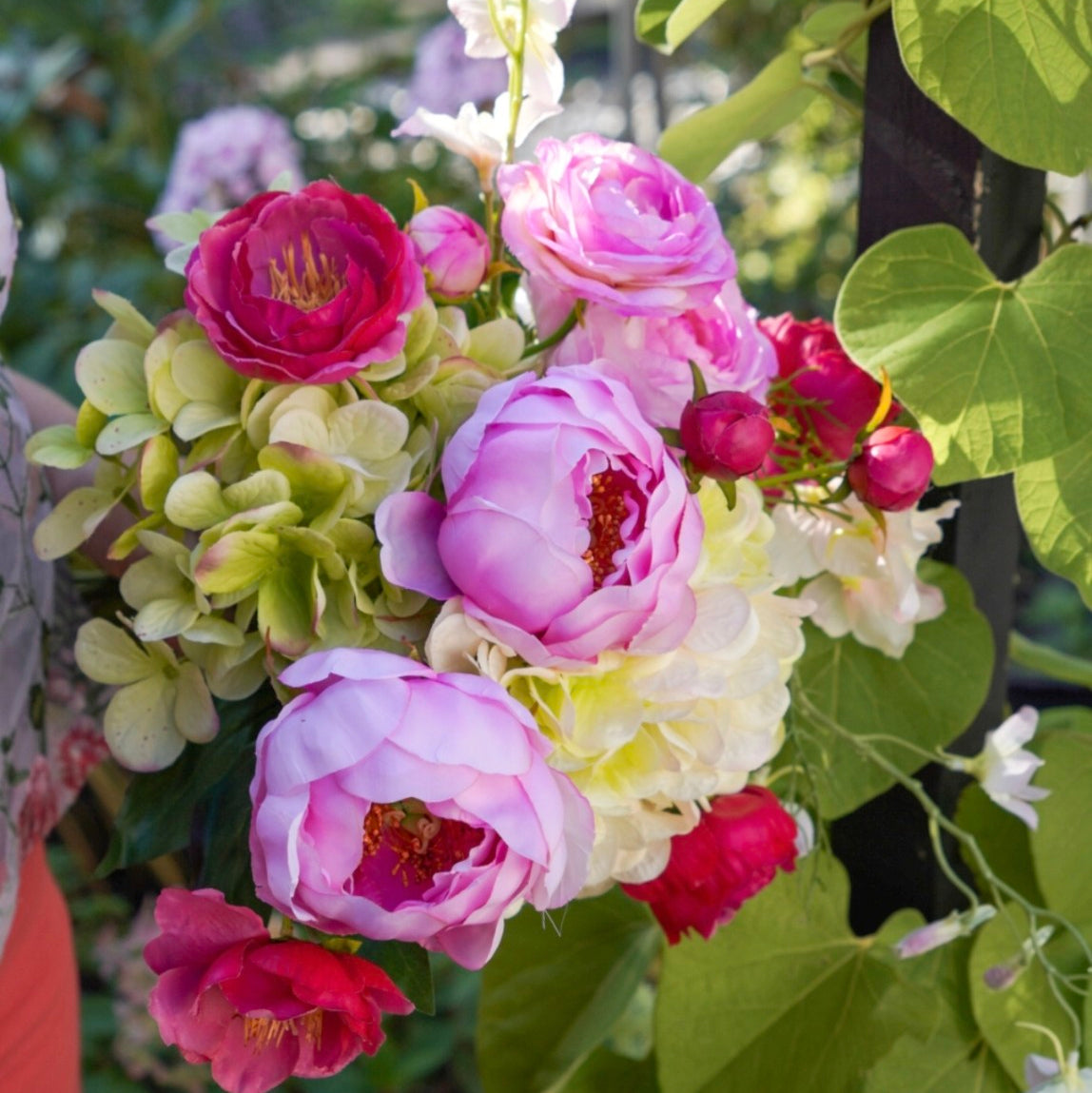 Elodie silk flower bouquet in a garden