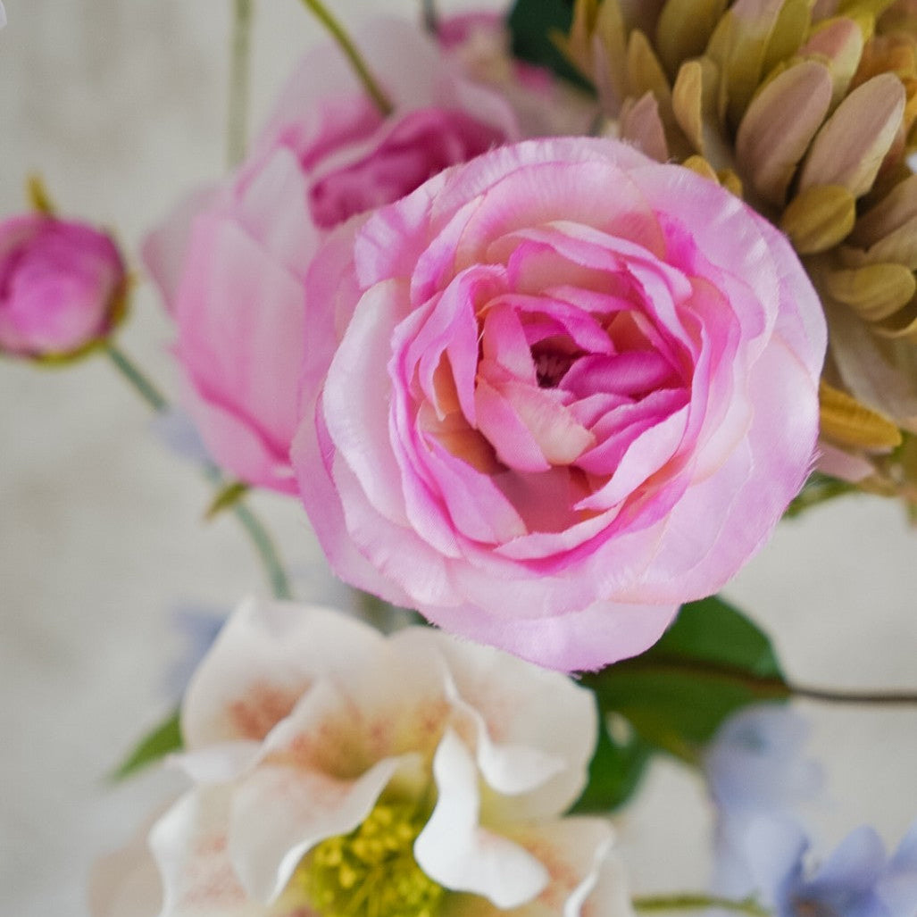 Close-up of pink peony and pale blue hyacinth in the Livia bouquet