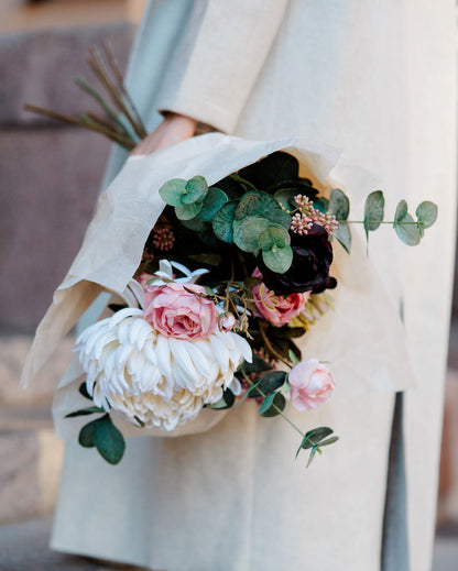 Roses, eucalyptus and pink berry branches in the Amara bouquet