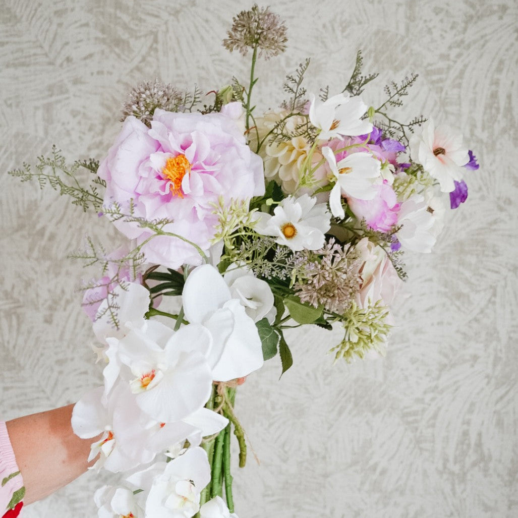 Full Isla silk flower bouquet held in hand