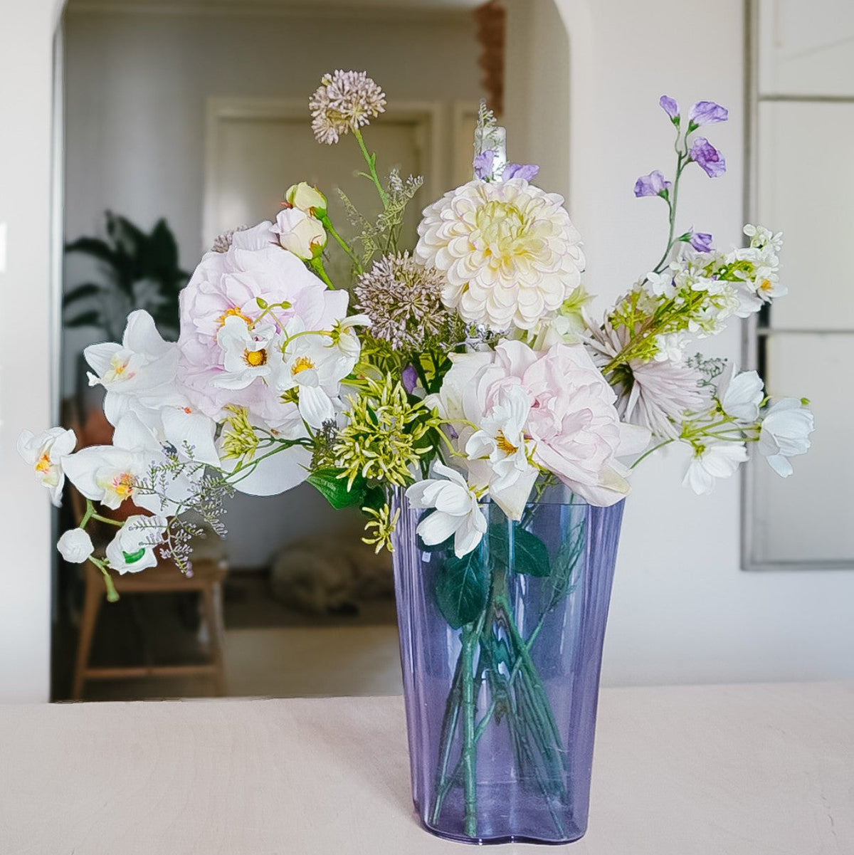 Isla silk flower bouquet in a vase in a home interior