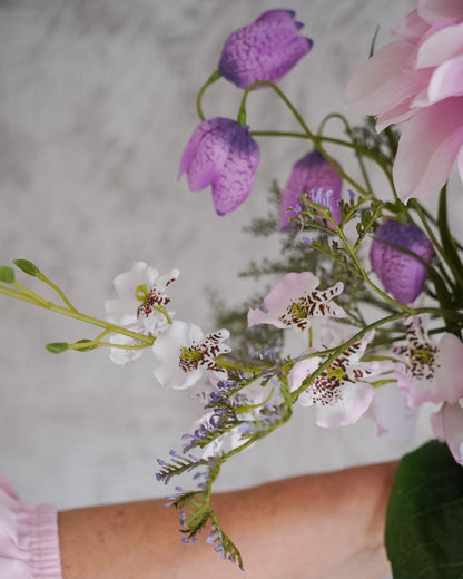 Full Lilac silk flower bouquet, arranged in a vase
