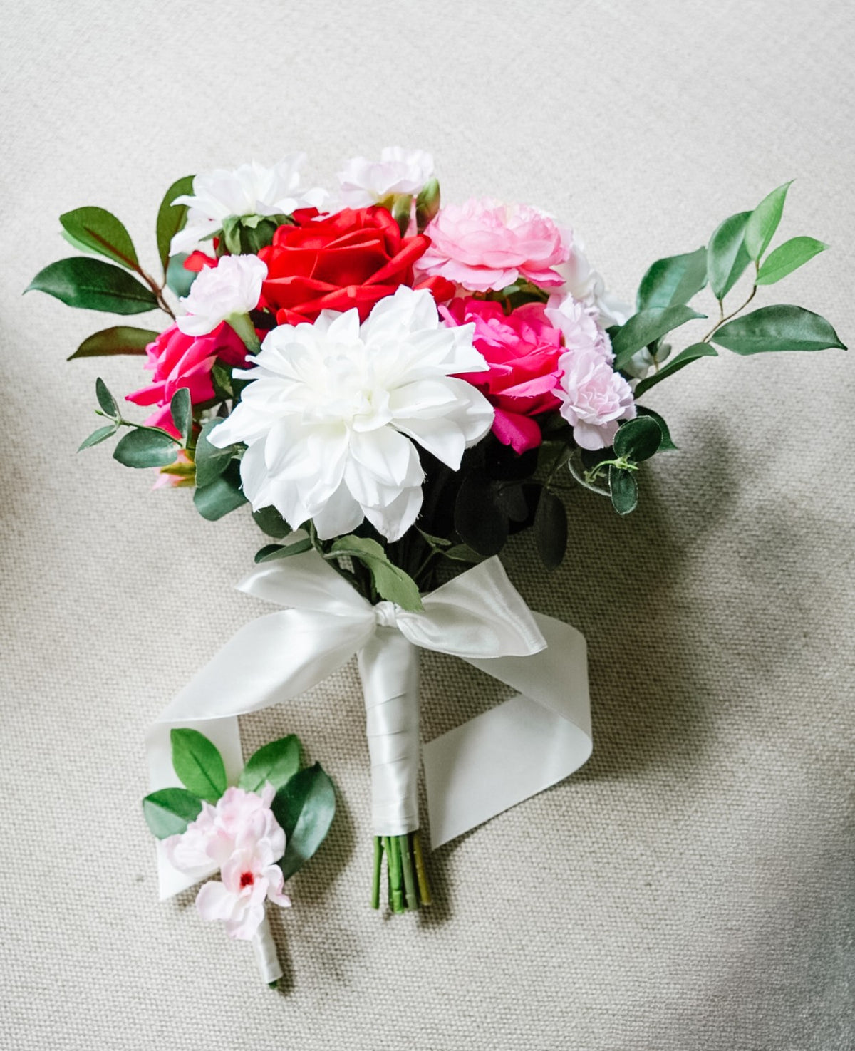 Silk wedding bouquet and buttonhole in red, white and pink