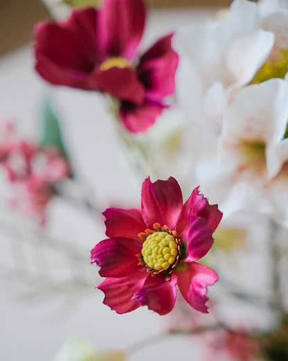 Close-up of burgundy cosmos in the Saga silk bouquet
