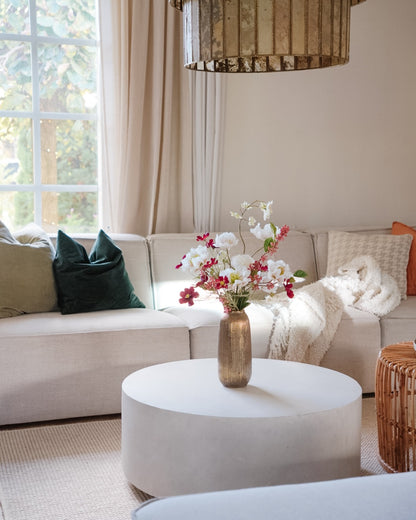 Saga silk flower bouquet in a vase in a living room interior